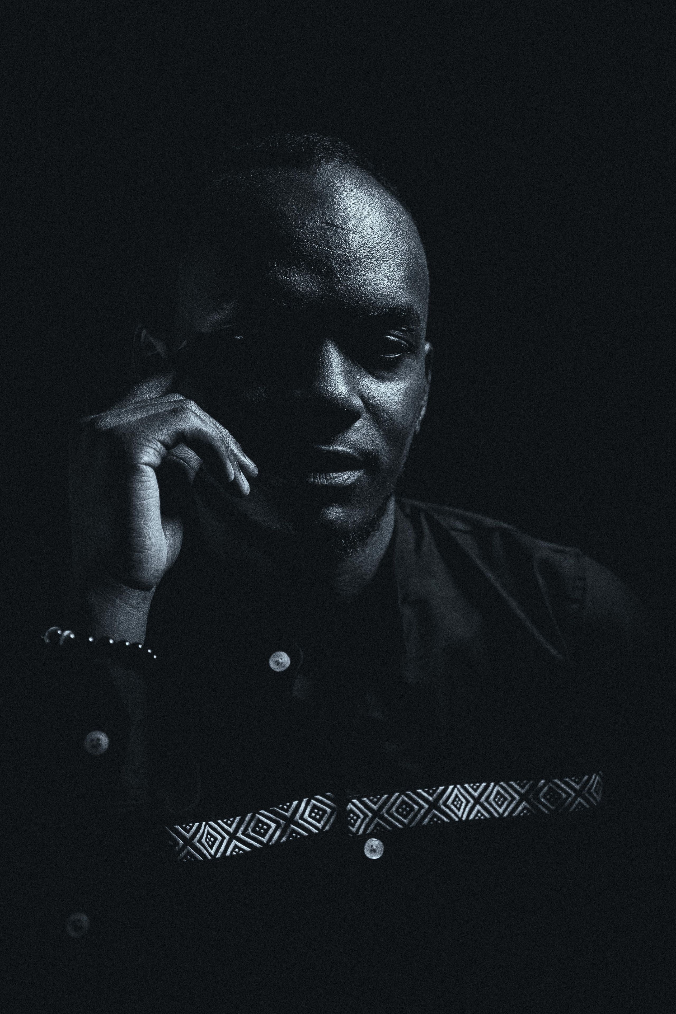 BLOC premium menswear — dark editorial portrait