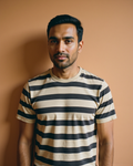 The Harbour Stripe Tee in Oat / Onyx — on model, yarn-dyed bands